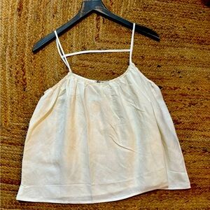 Linen tank tops available in white and tan